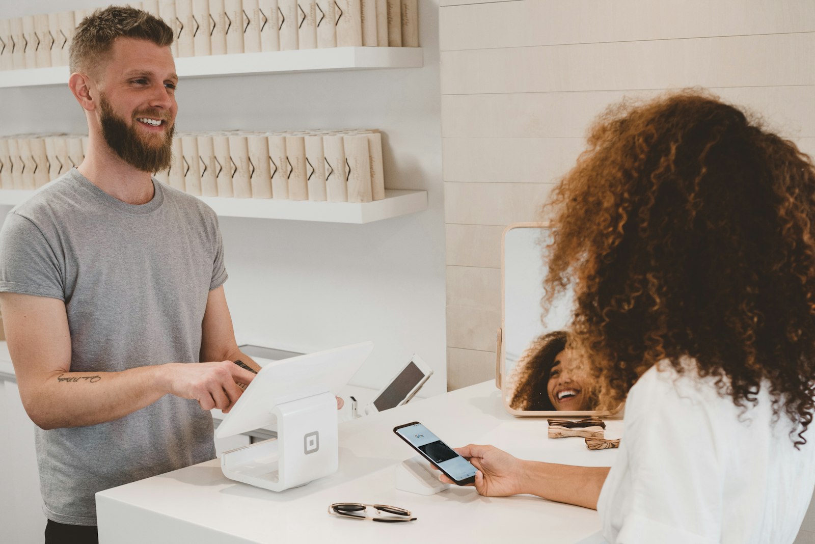 Customer paying at a counter terminal