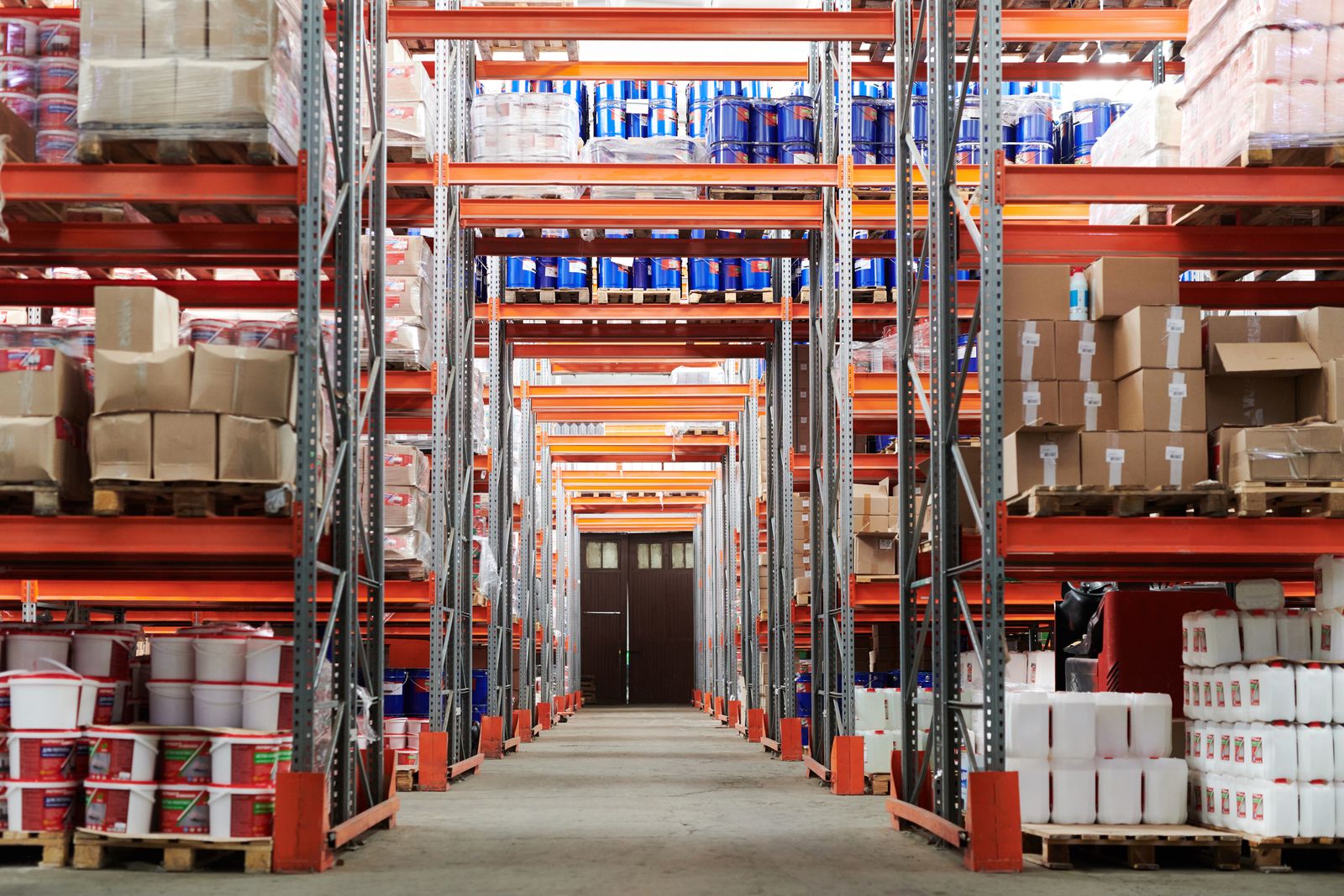 Pallet racking in a warehouse aisle